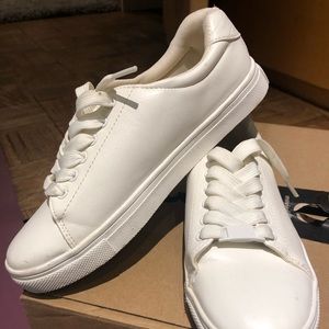 Pure white sneakers